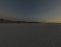 Night Sky over a Desert Landscape