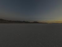 Night Sky over a Desert Landscape