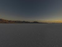 Night Sky over a Desert Landscape