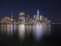 Night Skyline of New York City with Modern Architecture and Lake Reflection
