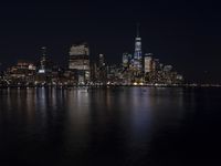 Night Skyline of New York City with Modern Architecture and Lake Reflection