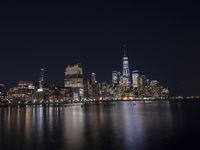 Night Skyline of New York City with Modern Architecture and Lake Reflection