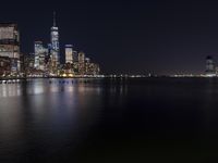 Night Skyline of New York City with Modern Architecture and Lake Reflection