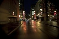 Night Skyline of Portland, Oregon Cityscape with Skyscrapers and Rain