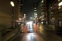 Night Skyline of Portland, Oregon Cityscape with Skyscrapers and Rain