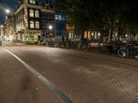 Night Time in Amsterdam: City Lights Illuminating the Streets