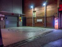 an empty parking garage with lights on it's doors and sign saying beware