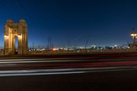 Night-time Cityscape with Illuminated Bridges and Highways