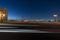 Night-time Cityscape with Illuminated Bridges and Highways