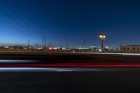 Night-time Cityscape with Illuminated Bridges and Highways