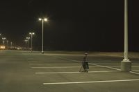 Night Time Street in a City with Parking Lot and Stadium