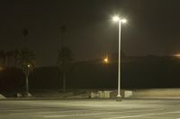 Night Time Street in a City with Parking Lot and Stadium