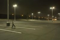 Night Time Street in a City with Parking Lot and Stadium