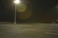 Night Time Street in a City with Parking Lot and Stadium