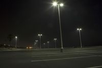 Night Time Street in a City with Parking Lot and Stadium