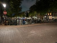 Night view of Amsterdam city with beautiful architecture and vibrant street life