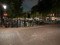 Night view of Amsterdam city with beautiful architecture and vibrant street life