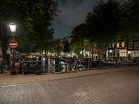 Night view of Amsterdam city with beautiful architecture and vibrant street life