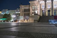 Night View of Berlin Architecture with City Lights and Water