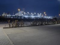 an industrial plant at night with no one in the room or on the side of the road