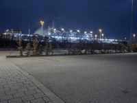 an industrial plant at night with no one in the room or on the side of the road