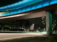 Night View of California City with Lit Up Buildings and Bridge