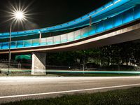 Night View of California City with Lit Up Buildings and Bridge