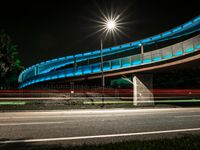 Night View of California City with Lit Up Buildings and Bridge