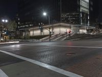 Night View of City with Illuminated Buildings and Roads