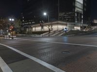Night View of City with Illuminated Buildings and Roads