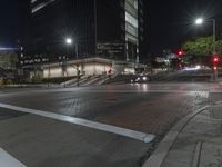 Night View of City with Illuminated Buildings and Roads