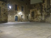 Night view of a classic architecture facade in Barcelona, Spain