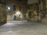 Night view of a classic architecture facade in Barcelona, Spain