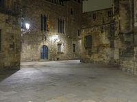 Night view of a classic architecture facade in Barcelona, Spain