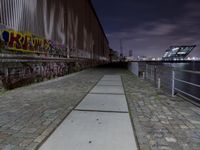 Night View of Hamburg Cityscape with River and Bridge in HafenCity, Germany