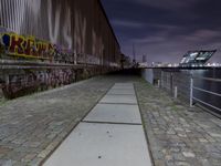 Night View of Hamburg Cityscape with River and Bridge in HafenCity, Germany