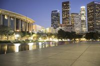 a view of a very big city at night time with a lot of lights on