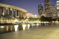 a view of a very big city at night time with a lot of lights on