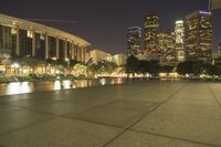 a view of a very big city at night time with a lot of lights on