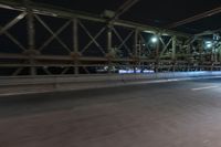 Night view of New York City architecture and road