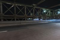 Night view of New York City architecture and road