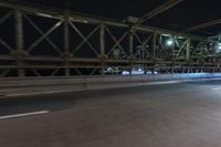 Night view of New York City architecture and road