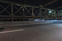 Night view of New York City architecture and road