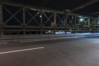 Night view of New York City architecture and road
