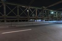 Night view of New York City architecture and road