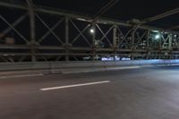 Night view of New York City architecture and road
