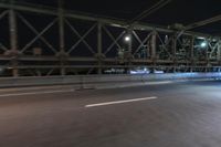 Night view of New York City architecture and road