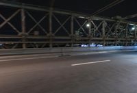 Night view of New York City architecture and road