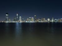 Night View of Manhattan Skyline Overlooking the Lake