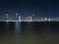 Night View of Manhattan Skyline Overlooking the Lake